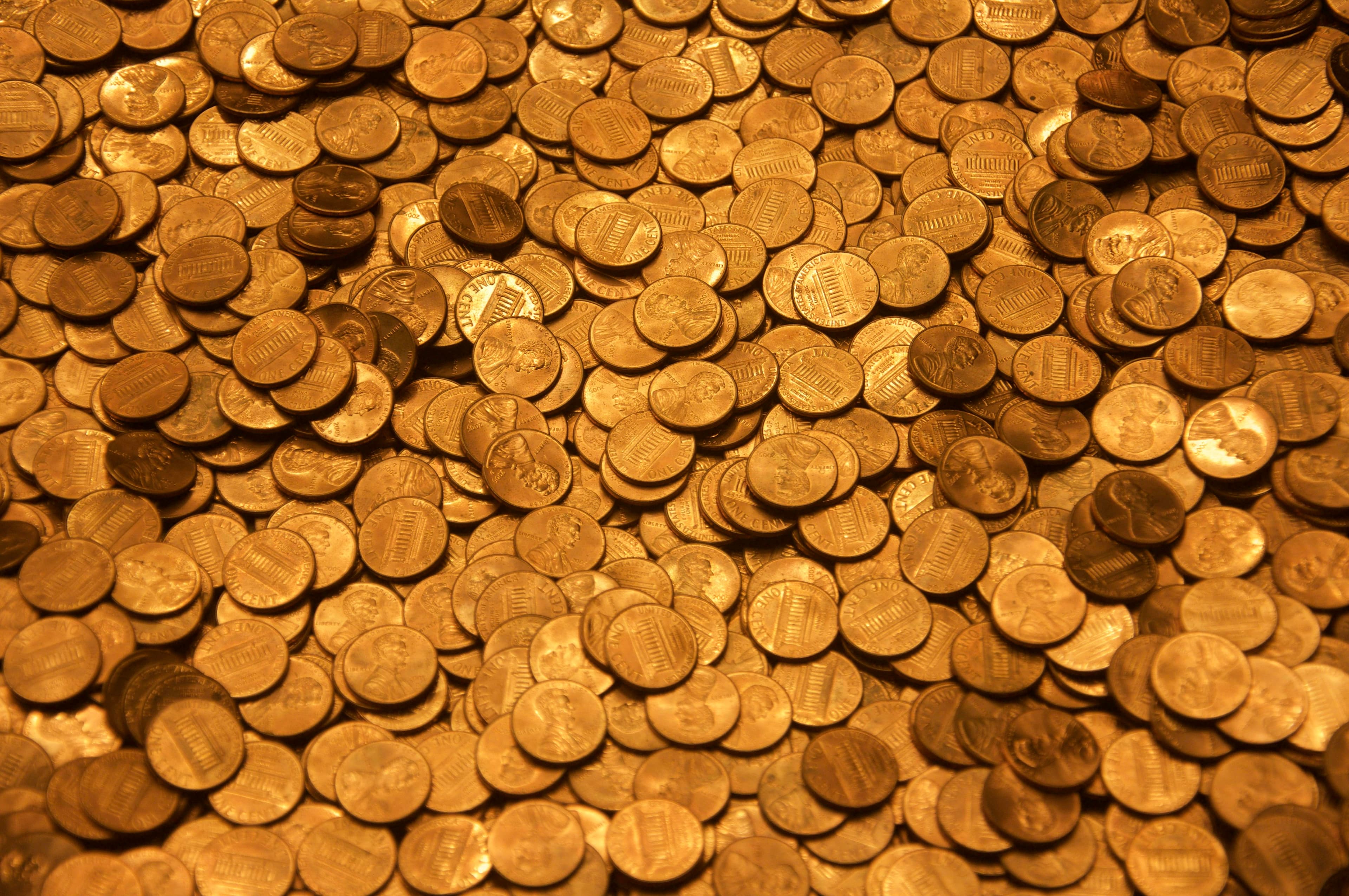 Brown round coins on a wooden surface