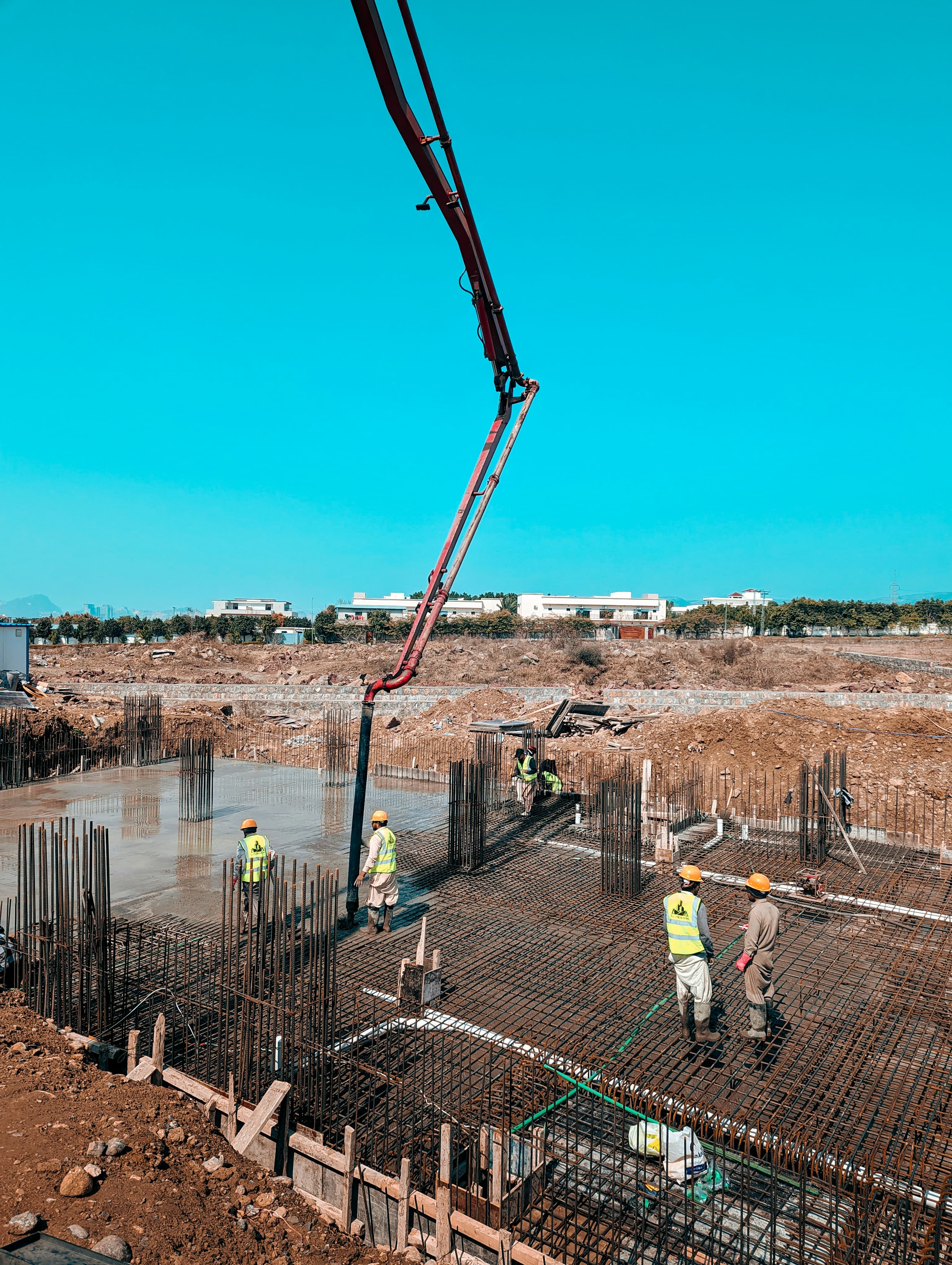 Construction workers working on a concrete site