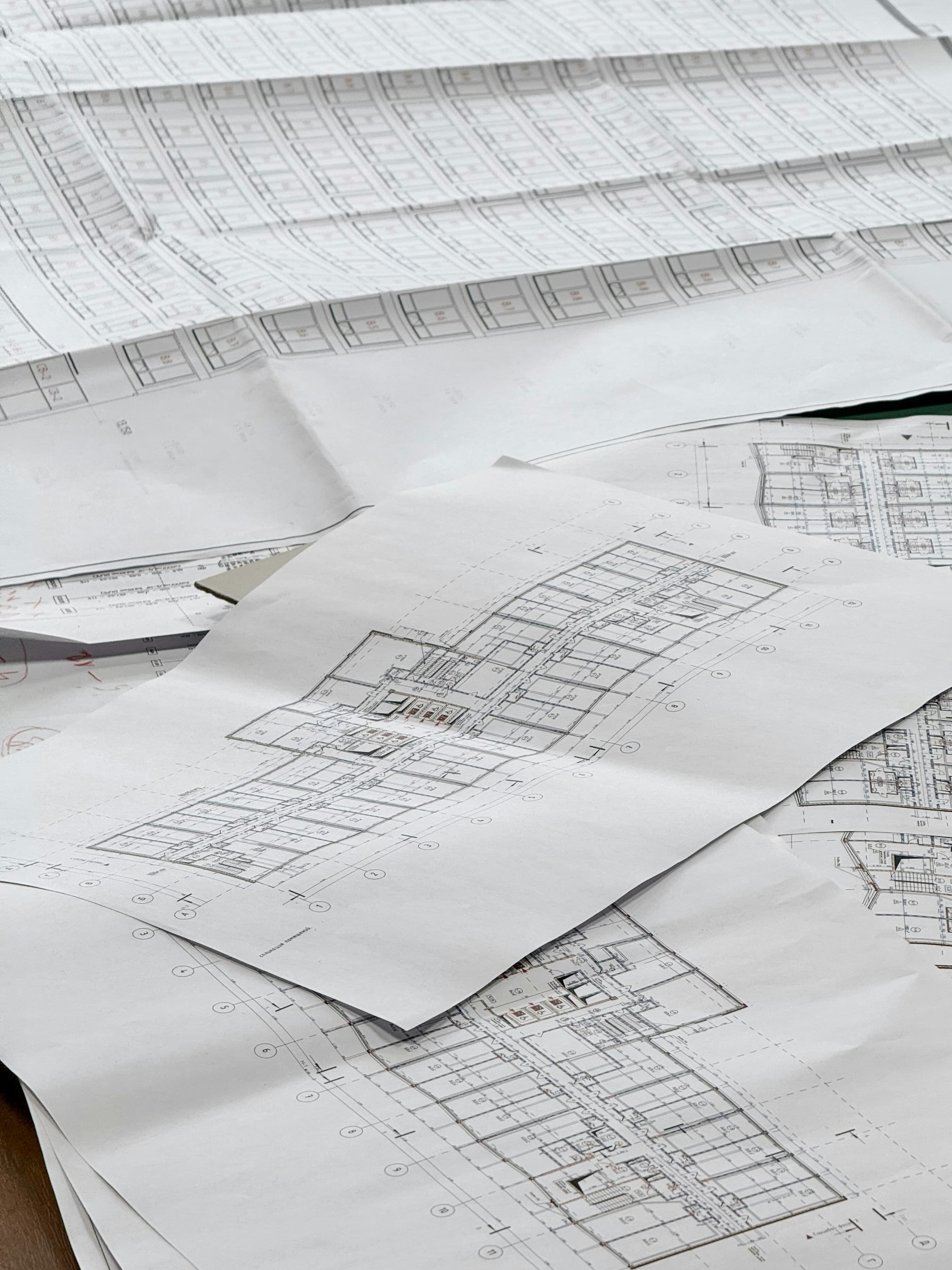Architectural blueprints spread out on a table